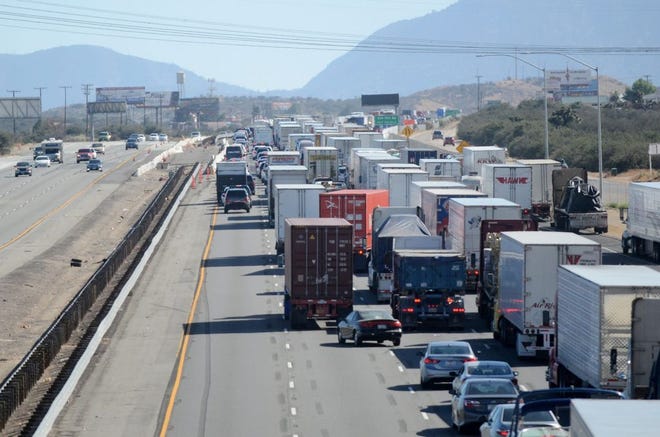 Traffic on southbound Interstate 15 is at a standstill as the North Fire rages in the Cajon Pass on Friday afternoon. David Pardo, Daily Press
