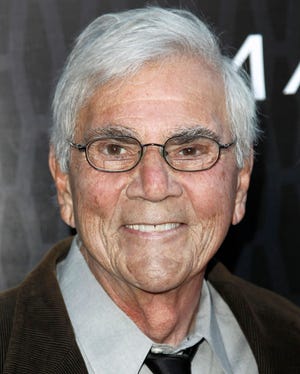 In this March 20, 2012 file photo, actor Alex Rocco arrives at the premiere "Magic City" in Los Angeles. Rocco, the character actor best known for playing the bespectacled Las Vegas mobster Moe Greene in "The Godfather," has died, his daughter announced Saturday, July 18, 2015. He was 79. (AP Photo/Matt Sayles, File)