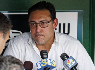 In this July 31, 2014, file photo, Philadelphia Phillies general manager Ruben Amaro Jr. pauses while speaking to reporters before the Phillies' baseball game against the Washington Nationals in Washington. (AP Photo/Alex Brandon, File)