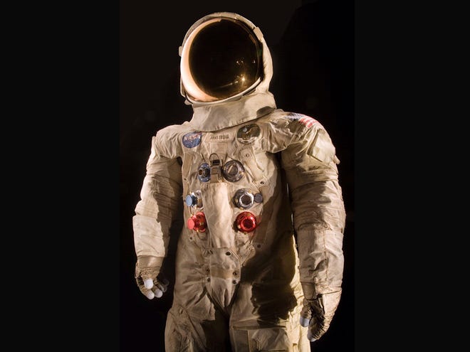 This handout photo provided by the National Air and Space Museum, Smithsonian Institution shows the spacesuit worn by astronaut Neil Armstrong, Commander of the Apollo 11 mission, which landed the first man on the moon on July 20, 1969. (Crop includes more black background than original.)