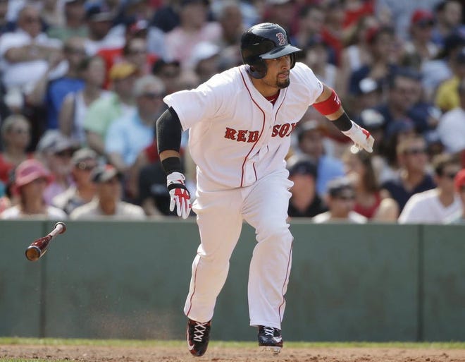 Shane Victorino singles in the sixth inning against the Yankees on July 12.