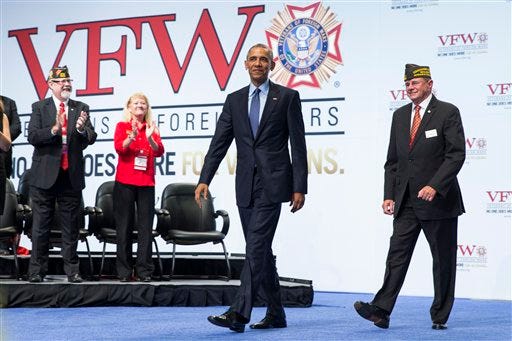 President Barack Obama arrives to deliver a speech at the 116th National Convention of the Veterans of Foreign Wars, on Tuesday, July 21, 2015, in Pittsburgh. Denouncing "chest-beating " critics, Obama told the veterans group that those who oppose the diplomatic agreement to rein in Iran's nuclear program are some of the same people who were quick to want to go to war in Iraq and thought military action there would take only a matter of months. (AP Photo/Evan Vucci)