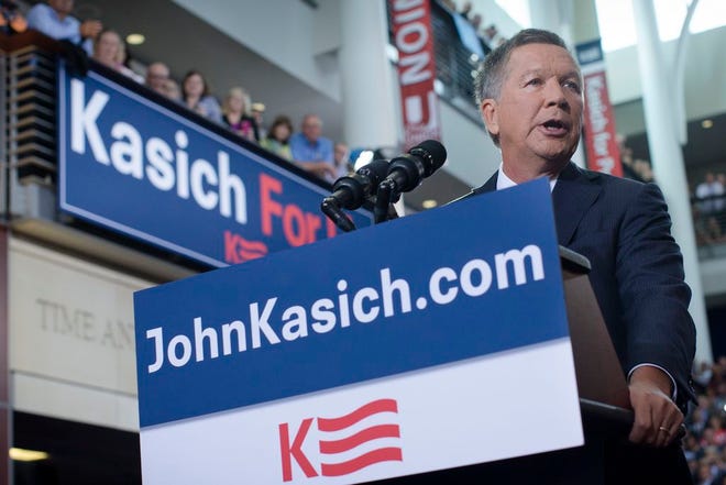 Ohio Gov. John Kasich announces he is running for the Republican Party's nomination for president during a campaign rally Tuesday at Ohio State University in Columbus.