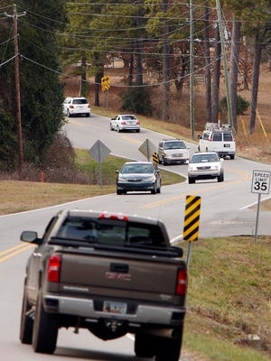 Vehicles drive down Mitt Lary Road in Northport Thursday, Jan. 29, 2015. Michelle Lepianka Carter | The Tuscaloosa News