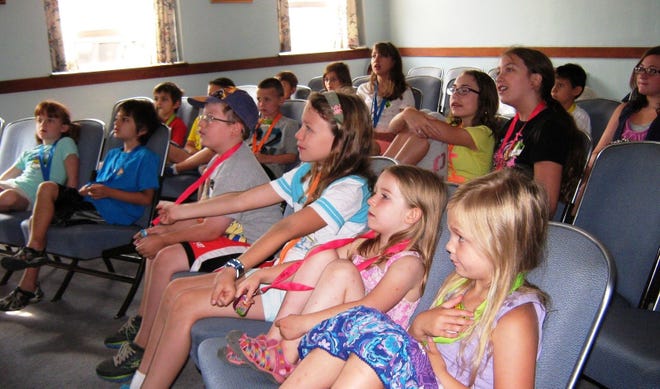 Students from First Baptist Church enjoy a film during Vacation Bible School in 2014. A new session runs July 27-31. Courtesy Photo