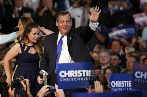 New Jersey Gov. Chris Christie arrives to speak to supporters during an event announcing he will seek the Republican nomination for president, Tuesday, June 30, 2015, at Livingston High School in Livingston, N.J. (AP Photo/Julio Cortez)