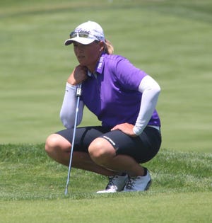 Katherine Kirk sizes up the green on Hole 9 at the Meijer LPGA Classic on Thursday, July 23. Greg Buckner/Sentinel Staff