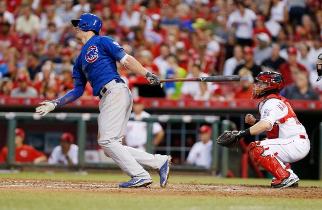 Chicago Cubs' Kris Bryant his a double off Cincinnati Reds' Michael Lorenzen (50) during the fifth inning of a baseball game, Monday, July 20, 2015, in Cincinnati.