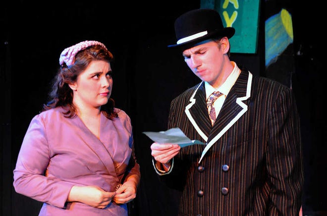 In the Bath House Players' production of "Guys and Dolls," which opens Friday at the Helen Hocker Theater in Gage Park, Nathan Detroit (Skyler Lindquist), right, reads a letter from the mother of his fiancee of 14 years, Miss Adelaide (Tori Everett) who has told her the couple married 12 years ago and have five children.