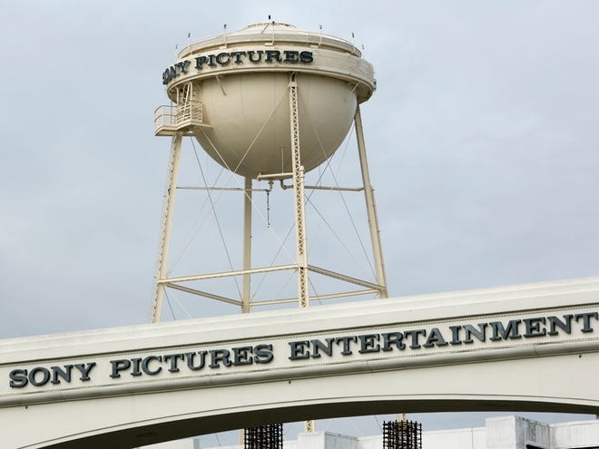 This Dec. 18, 2014, file photo shows a Sony Pictures Entertainment studio lot entrance from Culver Blvd. in Culver City, Calif.