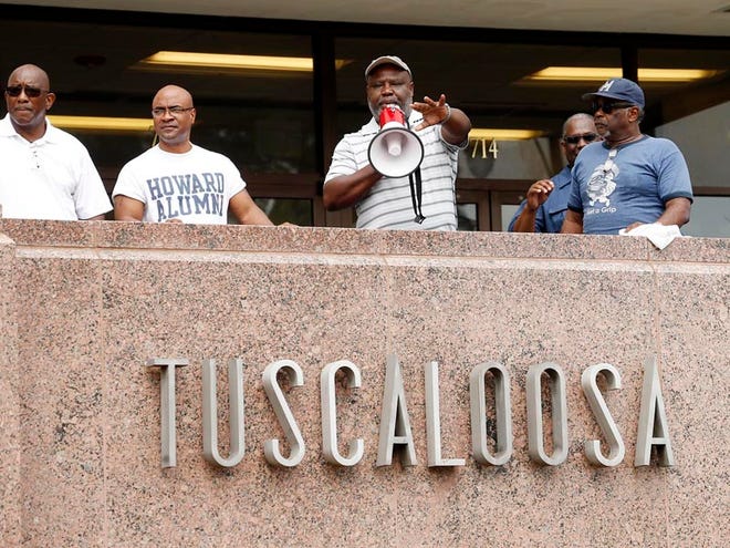 Jerry Carter, president of the Tuscaloosa Chapter of the NAACP, speaks at the conclusion of a march in commemoration of the 51st anniversary of "Bloody Tuesday" Tuesday, June 9, 2015.