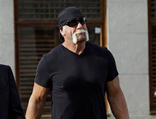 In this Oct. 15, 2012 file photo, former professional wrestler Hulk Hogan, whose real name is Terry Bollea, arrives for a news conference at the United States Courthouse in Tampa, Fla. World Wrestling Entertainment Inc. has severed ties with Hogan. AP Photo