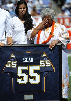 The Pro Football Hall of Fame says Junior Seau's daughter, Sydney Seau, left, will not be allowed to deliver a speech on her father's posthumous induction next month in Canton, Ohio. File/The Associated Press