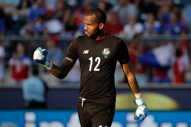 Panama goalkeeper Luis Mejia reacts after blocking a shot by United States' Michael Bradley during a penalty kick shootout in the CONCACAF Gold Cup third place soccer match, Saturday, July 25, 2015, in Chester, Pa. Panama won.