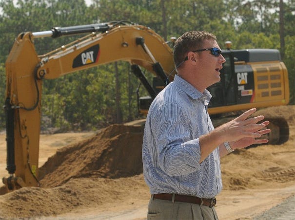 Bill Mumford, vice president of development for Newland Communities, talks about the company's plans for the new RiverLights neighborhood in Wilmington. Construction crews continue to work on the new River Road that will run through the neigborhood. Newland plans to close a nearly 3-mile stretch of River Road south of the Port of Wilmington for three months starting in September.