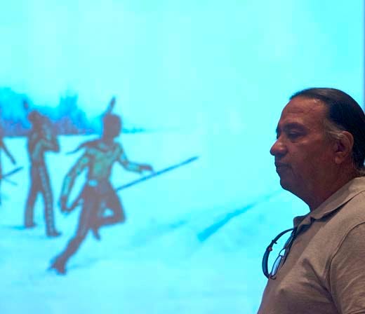 Joe Rickard lectures on the subject of snow snake, a traditional Iriquois game.