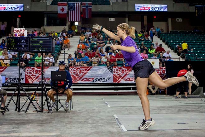 Junior girls champion Denise Daly competes during the Junior and Cadet World Championship Horseshoe Tournament on July 18. Daly won the match and advanced to claim the world championship title.