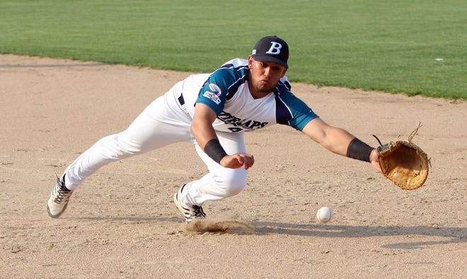 Brewster first baseman JC Escarra dives for a hot grounder in a game earlier this season. Escarra went 1-for-3 on Sunday and the Whitecaps defeated Falmouth 4-3.

STEVE HAINES/CAPE COD TIMES