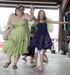 From left, Stephanie Gustin and Natalie Rissman, 9, dance during the Great American Irish Festival at the Herkimer County Fairgrounds on Saturday. GATEHOUSE NEW YORK PHOTO/TINA RUSSELL