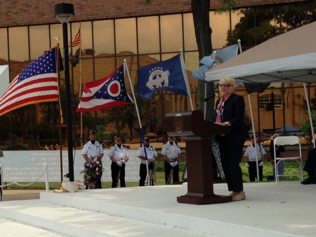 Mayor Kathy Catazaro-Perry speaks Sunday afternoon during the dedication of the Blue Star Memorial marker and the closing ceremony of the Ohio Flags of Honor display.
