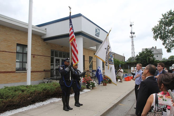 Hundreds of people, including U.S. Representatives David N. Cicilline and James Langevin, attended Sunday's ceremony to name the Elmwood Avenue post office in honor of Sister Ann C. Keefe. It is the first U.S. post office named for a nun. The Providence Journal/Glenn Osmundson