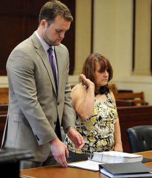 Maria C. Pereira in Brockton Superior Court on July 17, 2015 with her attorney Ian Davis.