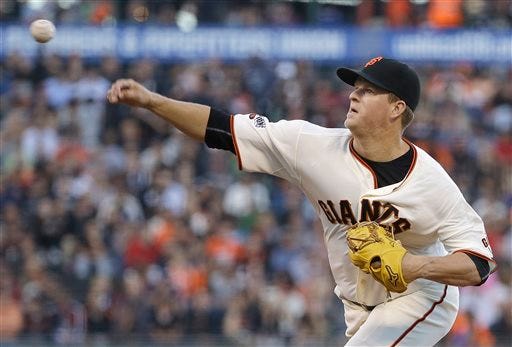 San Francisco Giants pitcher Matt Cain throws against the Milwaukee Brewers during the second inning of a baseball game in San Francisco, Tuesday, July 28, 2015. (AP Photo/Jeff Chiu)