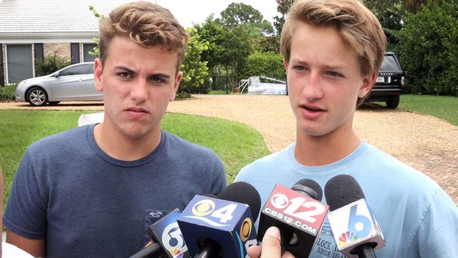 Matthew Lavallee (left) and Peyton Schoor, friends of missing Tequesta teens Austin Stephanos and Perry Cohen, talk about the kids and their confidence in their boating abilities Wednesday, July 29, 2015. (Lannis Waters / The Palm Beach Post)
