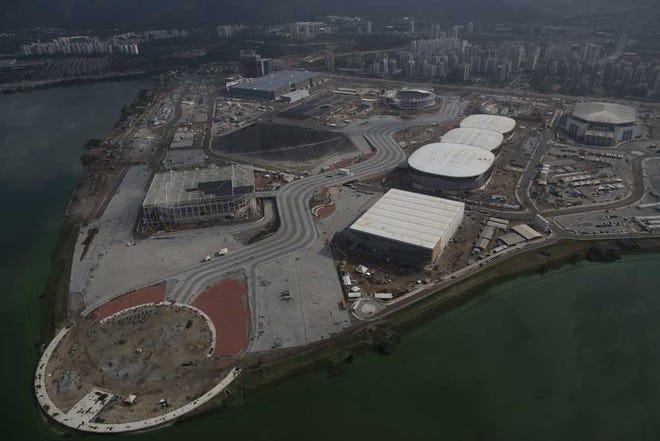 The Olympic Park which will host Rio's 2016 Olympics is seen under construction in Rio de Janeiro, Brazil, Monday, July 27, 2015. The Olympics will offer 28 sports, 300 events, 10,500 athletes and, with the exception of five football venues, it's all packed into Rio for 17 days. The Paralympics add two more weeks, and thousands more athletes. (AP Photo/Leo Correa)