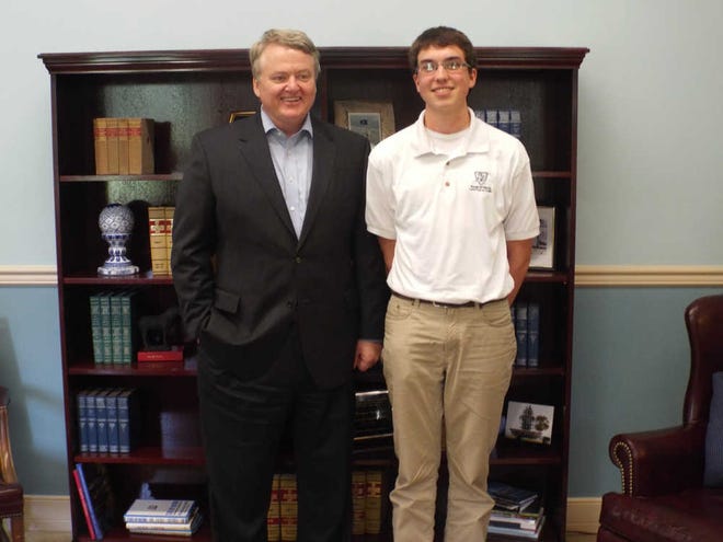 Special to Jasper County Sun Times State Treasurer Curtis Loftis talked with Representative for a Day speech contest winner Collin Soucy about the funding process for roads. Soucy's speech was on road improvement.