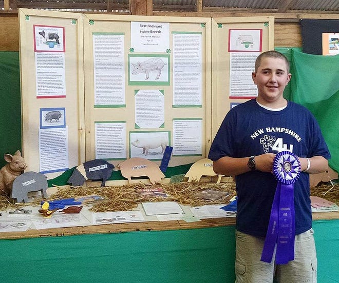 Rockingham County 4-H member Patrick Marcoux, of Brentwood, received the Commissioners Award for Excellence in Agricultural Promotion at the Stratham Fair. His display þÄúBest Backyard Swine BreedsþÄù was recognized by the Commissioners as the outstanding exhibit promoting a better understanding of agriculture and rural life. Marcoux raises swine and poultry on his family farm in Brentwood. For more information on 4-H programs in Rockingham County, visit bit.ly/RockCty4H or call 679-5616. Courtesy photo