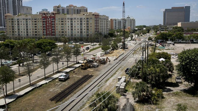 All Aboard Florida is building a station in downtown West Palm Beach along the Florida East Coast Railway corridor. Construction on the station is seen here on June 23, 2015. (Greg Lovett / The Palm Beach Post)