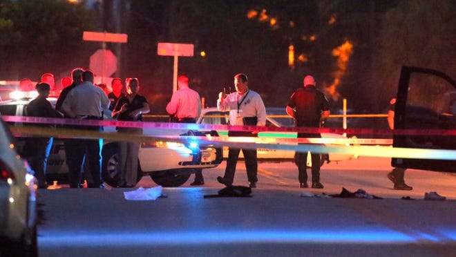 The Palm Beach County Sheriff's Office is investigating a deputy-involved shooting that critically injured a person Thursday morning, July 30, 2015 on Lakewood Road near Military Trail. PBSO said a deputy shot a person at 5:15 a.m. A little north of Lake Worth Road. (Lannis Waters / The Palm Beach Post)