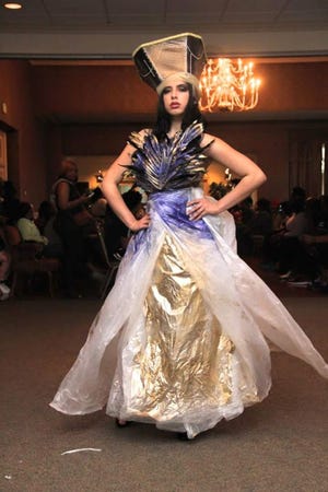 Local fashion designer Julionne Johnson's Recycled Integrated Possibilities Designs features recycled paper and materials.
