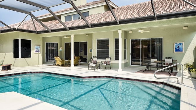 Open floor plan with large screen enclosed pool and spa. Great for entertaining!