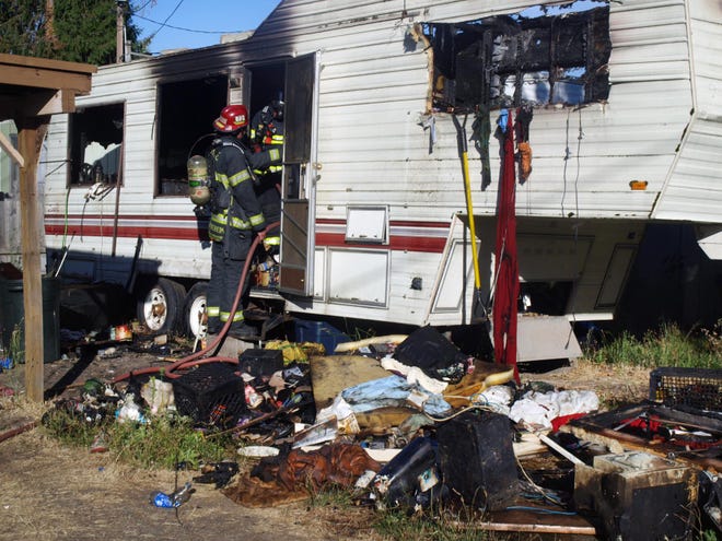 The mobile home at Space 9 in the Springfield Mobile Home Park was destroyed, but no other units in the densely populated park were damaged by the blaze. (Randi Bjornstad/The Register-Guard)