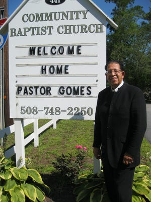 Rev. Robert Gomes has returned to the church he founded in Marion, the Community Baptist Church, 441 Front St. Church members show how they feel about his return on a display sign. DEB RYAN/STANDARD-TIMES SPECIAL