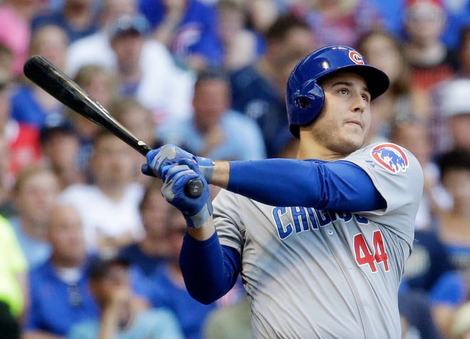 Chicago Cubs' Anthony Rizzo hits a three-run home run during the third inning of a baseball game against the Milwaukee Brewers Saturday, Aug. 1, 2015, in Milwaukee. (AP Photo/Morry Gash)