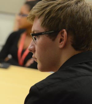 High school student Matthew Furey, of Edgewater Park, listens during a class on gastrointestinal emergencies in the MEDacademy program at the Cooper Medical School of Rowan University in Camden.