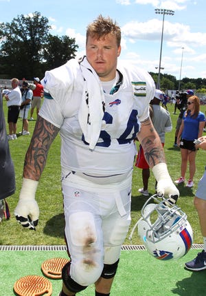 Buffalo Bills guard Richie Incognito (64) walks from the field at the teams NFL football training camp in Pittsford, N.Y., Sunday, Aug. 2, 2015.