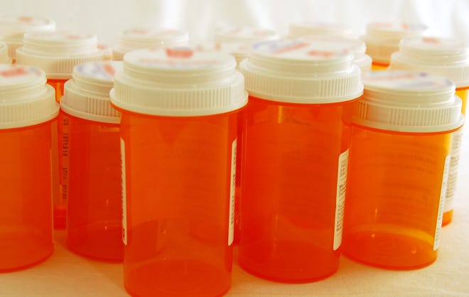 Prescription bottles used to store medicine.