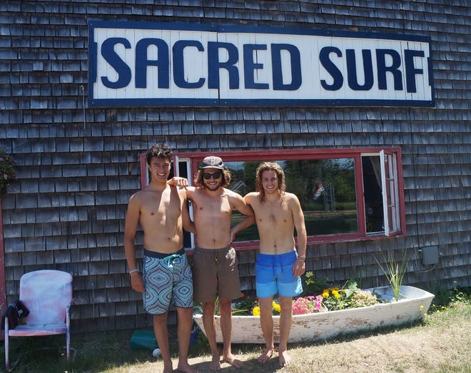The crew at Sacred Surf Shop, from left, Matt Serio, Johnny Benovito and owner Zach Pawa. STAFF PHOTO BY MARILYN MILLER