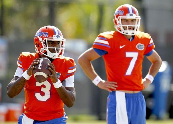 Florida quarterbacks Treon Harris, left, and Will Grier will again compete for the starting job starting Thursday.