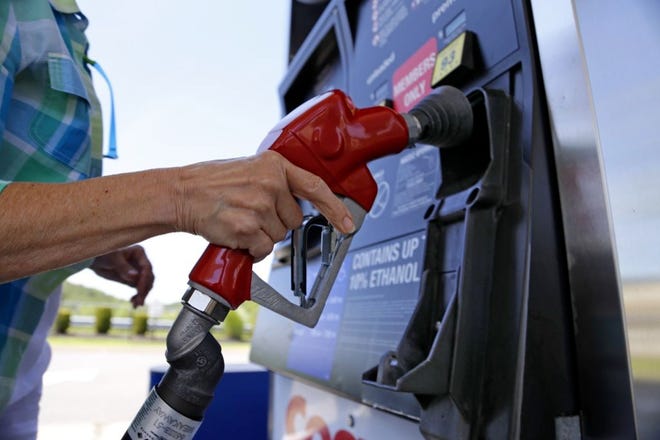 GASOLINE PRICES  are falling even though Americans are driving at near record levels. Analysts say some parts of the country could see prices dip below $2 per gallon.