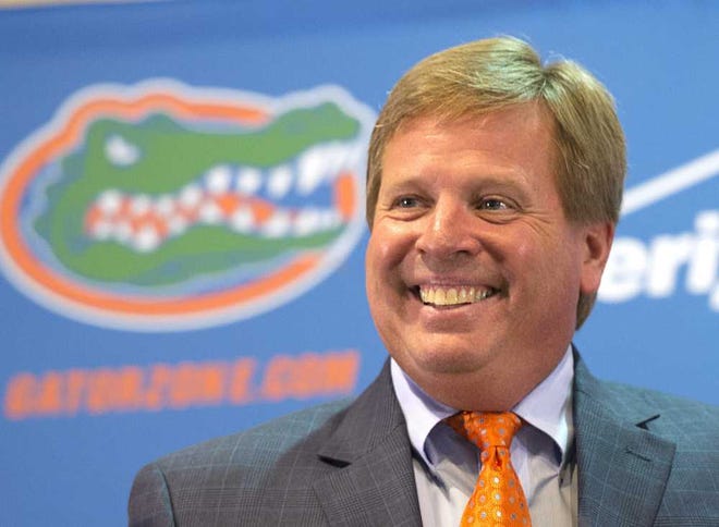 Florida NCAA college football coach Jim McElwain talks with the media at the teams media day in Gainesville, Fla., Wednesday, Aug. 5, 2015. (AP Photo/Phil Sandlin)