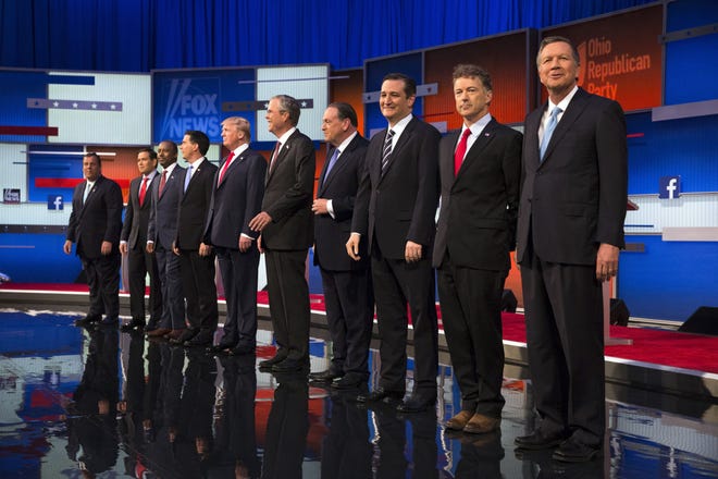 Republican presidential candidates from left, Chris Christie, Marco Rubio, Ben Carson, Scott Walker, Donald Trump, Jeb Bush, Mike Huckabee, Ted Cruz, Rand Paul, and John Kasich take the stage for the first Republican presidential debate at the Quicken Loans Arena Thursday, Aug. 6, 2015, in Cleveland. THE ASSOCIATED PRESS