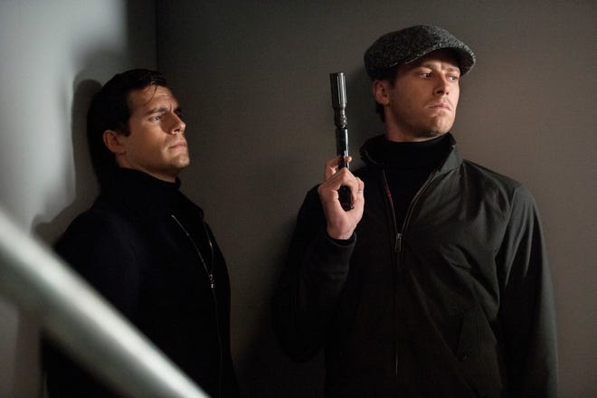 Enemies-turned-partners Napoleon Solo (Henry Cavill) and Ilya Kuryakin (Armie Hammer) try to get out of a jam.
