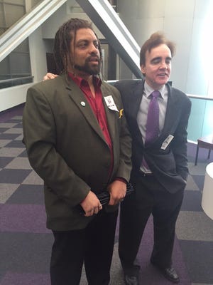 Edward "NJWeedman" Forchion (left) and his attorney John Vincent Saykanic (right) speak to media in this photo from 2015.  Forchion's lawsuit against Trenton police and the Mercer County prosecutor's office will now be tried in federal court along with his other civil suit.