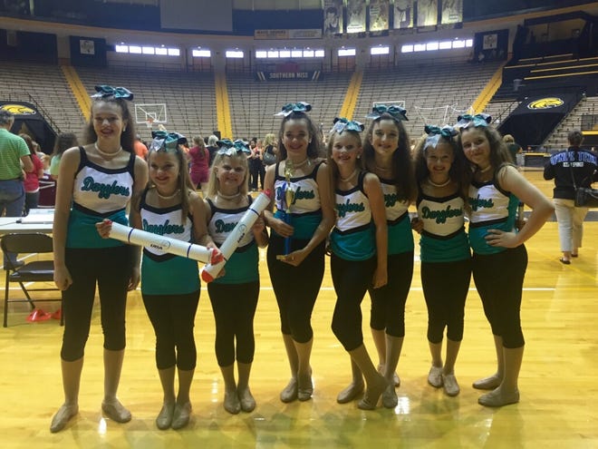 The DMS Dazzlers team with their spirit stick awards at the UDA camp in Hattiesburg.