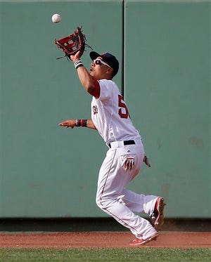 Red Sox outfielder Mookie Betts, seen here during a July game, rejoined the team in Detroit on Friday. AP photo